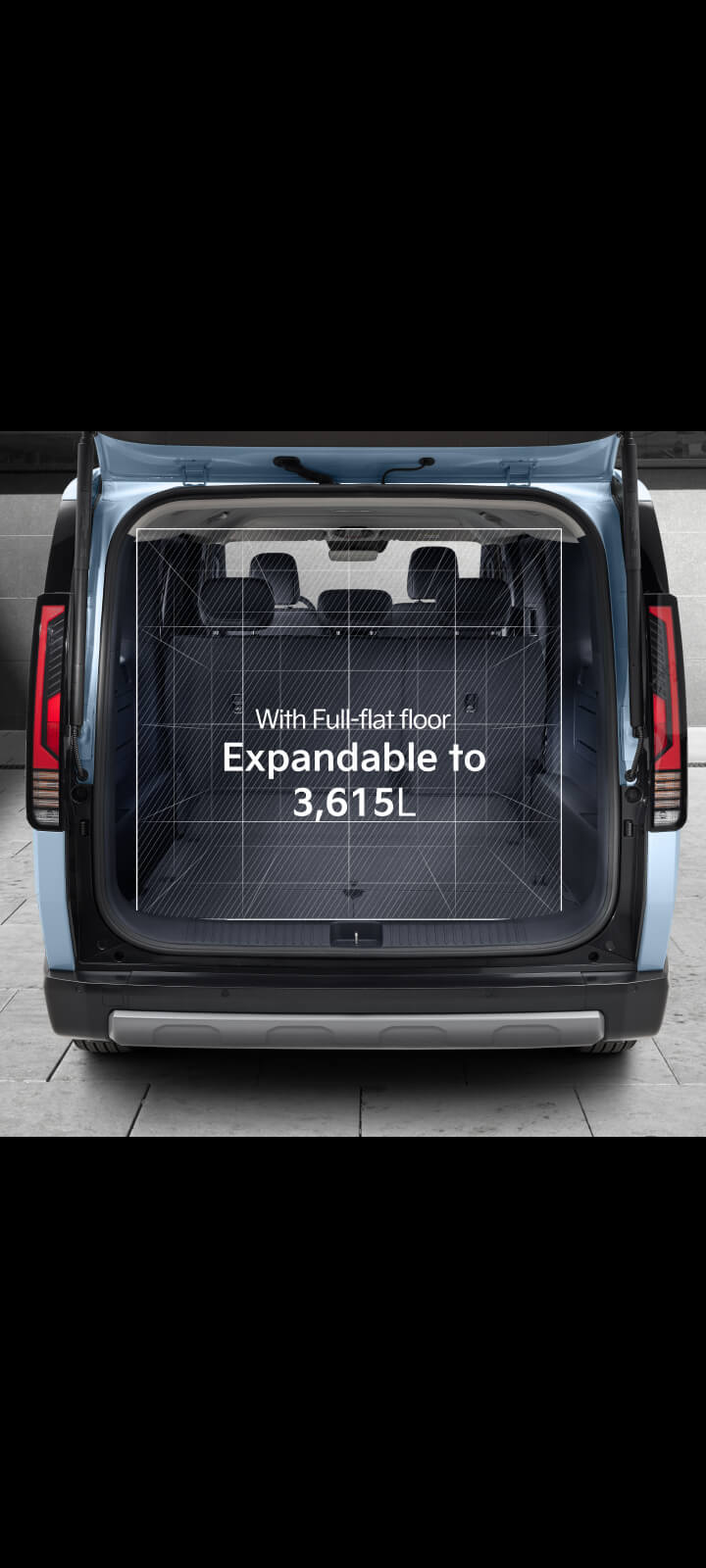 Interior view of the Kia PV5 Passenger cabin showing foldable seatback tray in open position