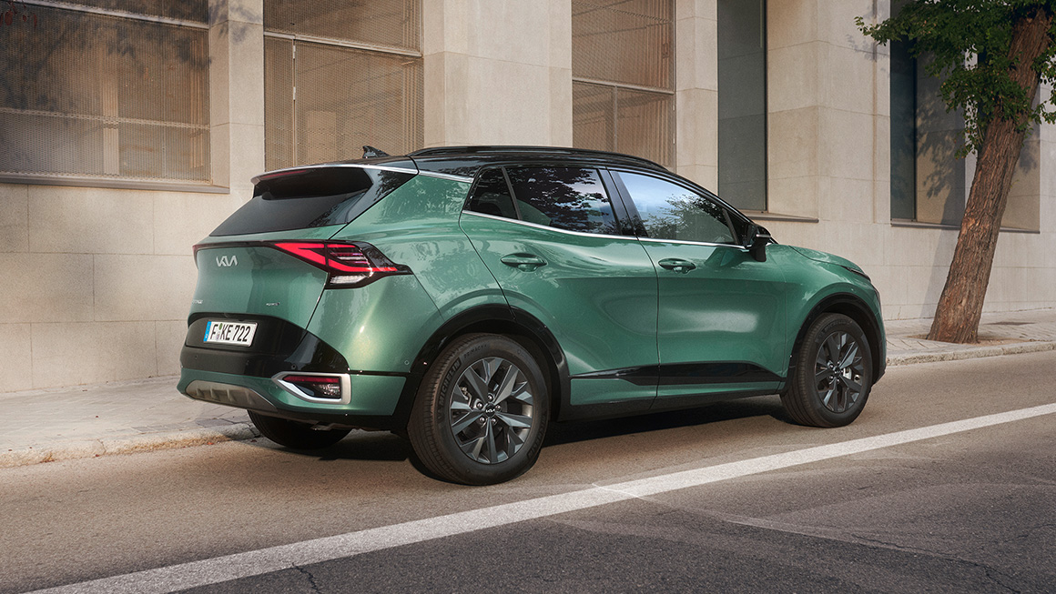 Seitenansicht eines grünen Sportage, Beifahrerseite